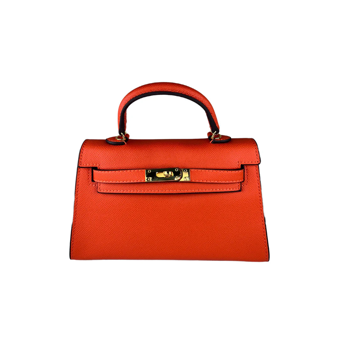 Orange de Luxe Handbag in chic color, featuring a textured surface and metallic closure