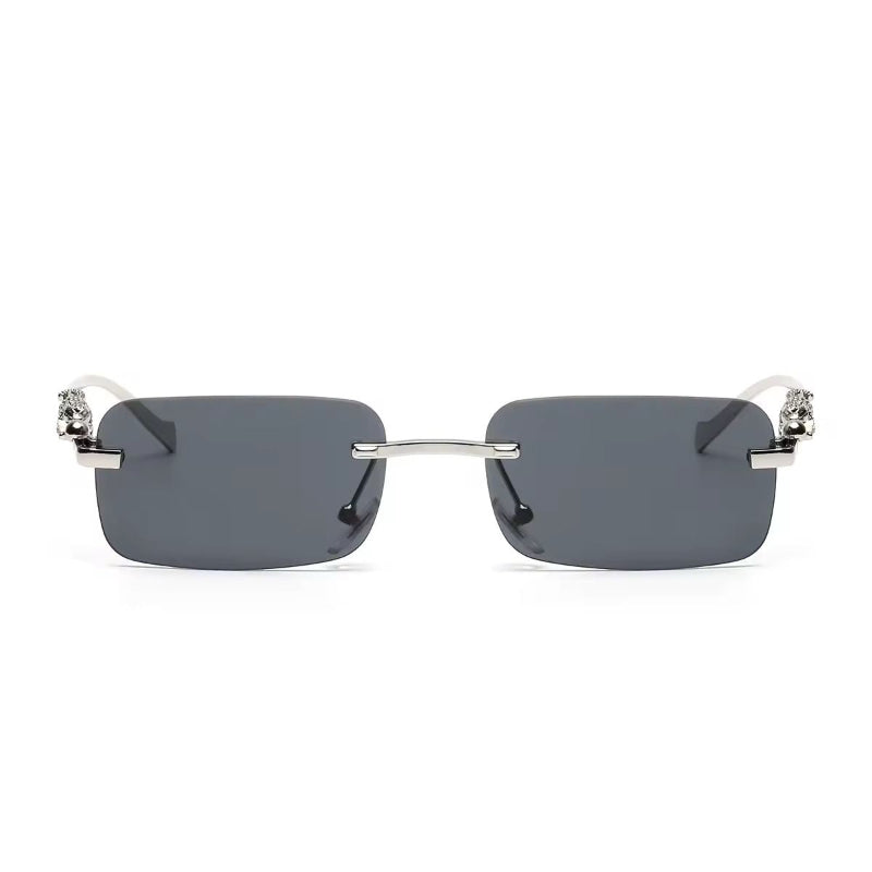 Jet black rectangular rimless sunglasses with UV400 lenses and golden panther arms

