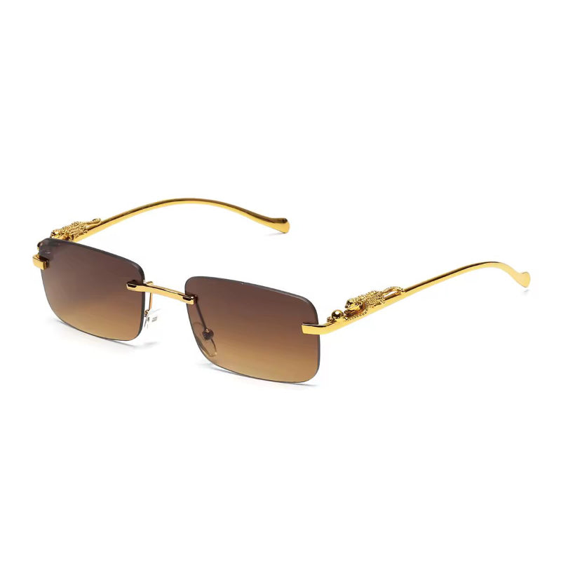 Brown UV400 sunglasses with rimless frame and golden big cat design on the temples
