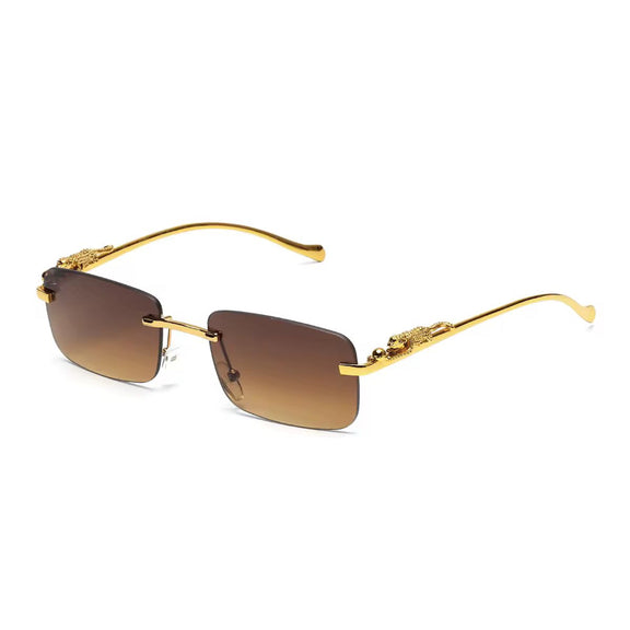 Brown UV400 sunglasses with rimless frame and golden big cat design on the temples

