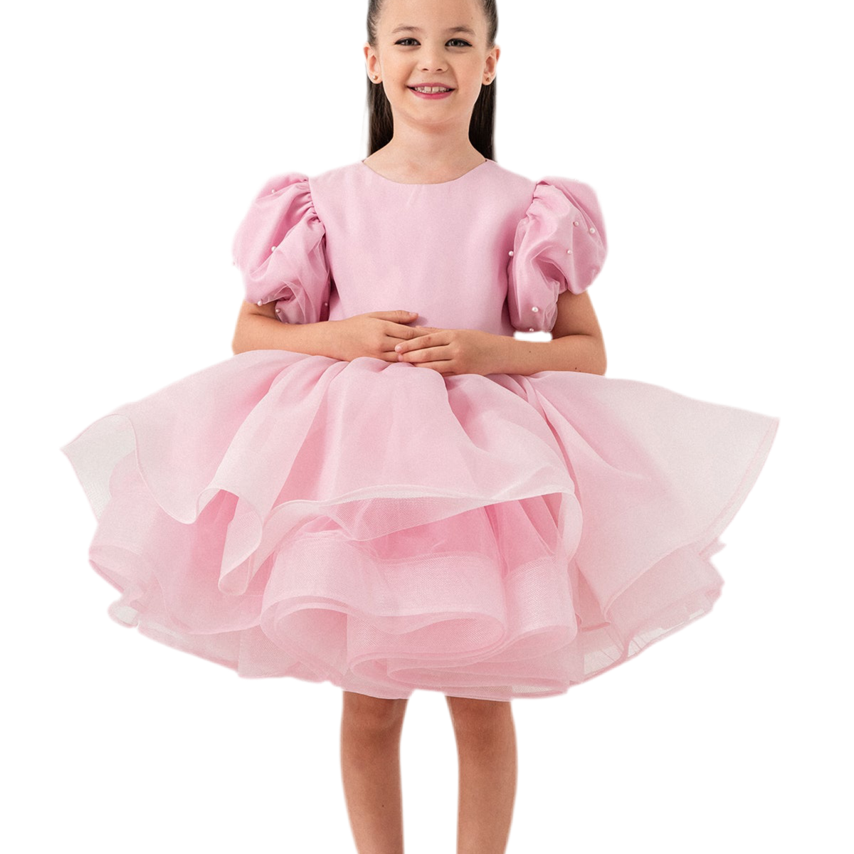 Luxury blush pink princess dress for toddler girls featuring elegant hand-sewn pearl embellishments on puff sleeves, a voluminous layered tulle skirt, and a dramatic oversized bow at the back. Perfect for birthdays, weddings, flower girl moments, and formal occasions. Soft 100% cotton lining for sensitive skin. Couture-inspired, handmade design for unforgettable childhood memories. Ideal for premium kids fashion, special occasion outfits, and baby girl party dresses. Elegant toddler outfit with invisible zi