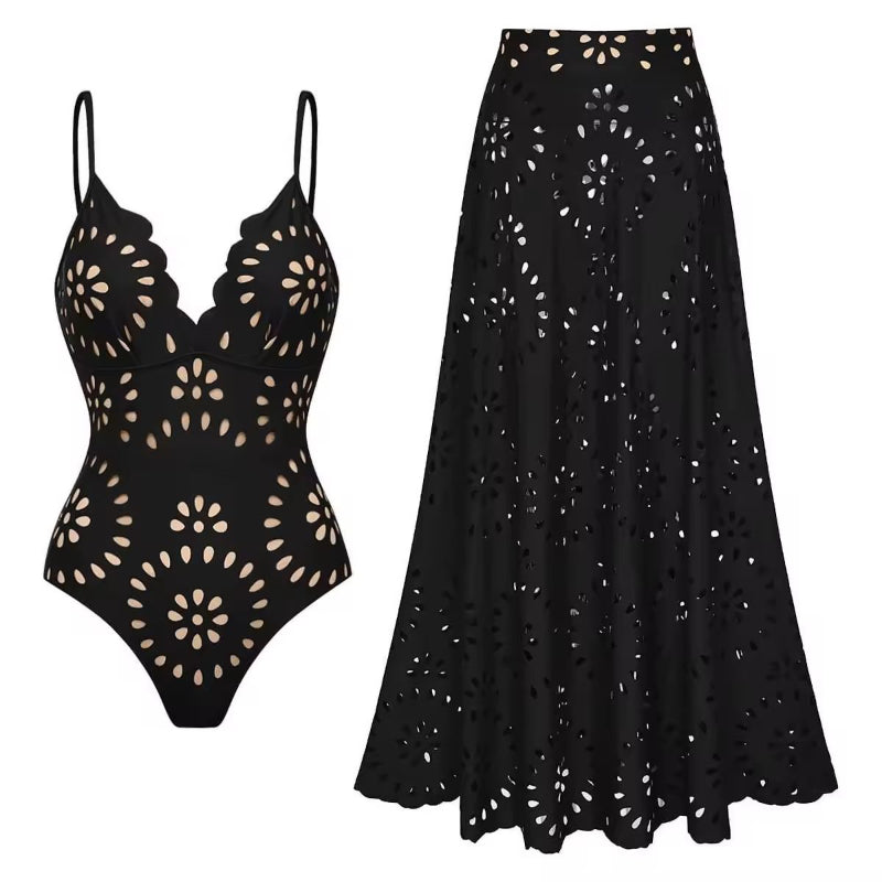 Chic black three-piece women’s set featuring floral laser-cut details – includes a scalloped bodysuit with thin adjustable straps and deep V-neckline, paired with a flowy high-waisted maxi skirt. Made from soft polyester-spandex blend. Perfect for beachwear, resort looks, or elegant summer outfits.