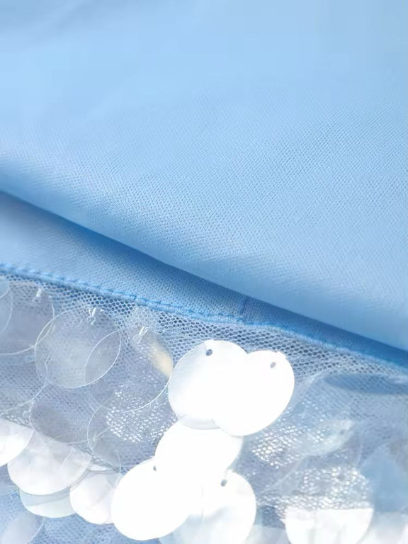 Shimmering sequin and linen-polyester fabric blend in light blue, airy and luxurious texture.