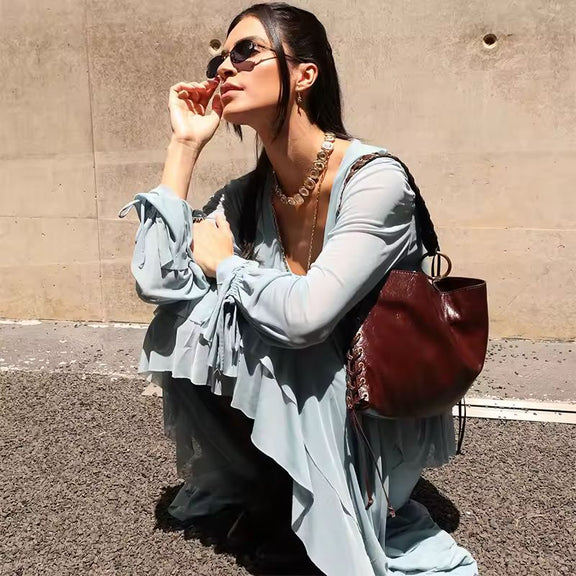 Breezy ankle-length dress in pastel blue with romantic ruffles and soft polyester fabric – casual yet chic