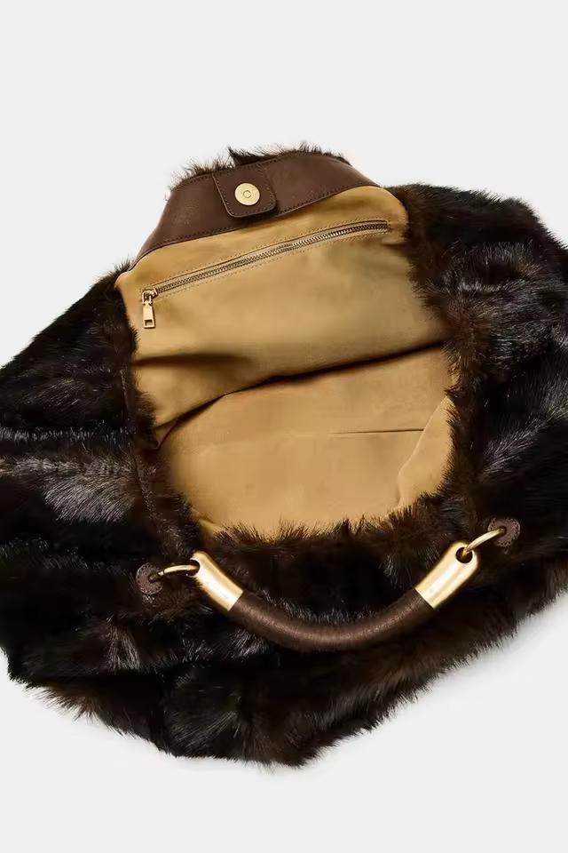High-quality faux fur texture with golden hardware – luxury vegan handbag for elegant women.