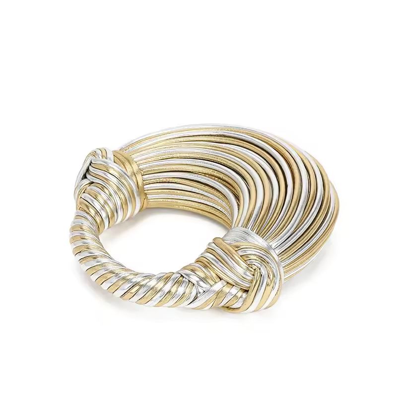 Fashion-forward woven clutch in gold and silver for events, weddings and daily wear