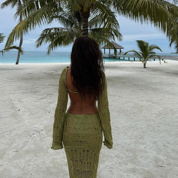 Elegant sheer knit maxi dress with open pattern and shimmer – perfect for trendy beach and holiday looks