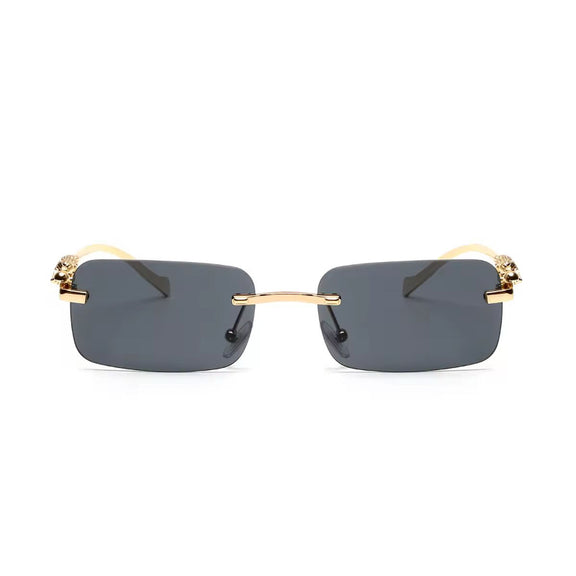 Rimless UV400 sunglasses with dark grey gradient lenses and gold panther detail
