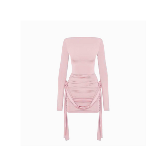 Blush pink long-sleeve jersey bodycon dress with side draping ties and boat neckline – elegant and figure-hugging women’s outfit.