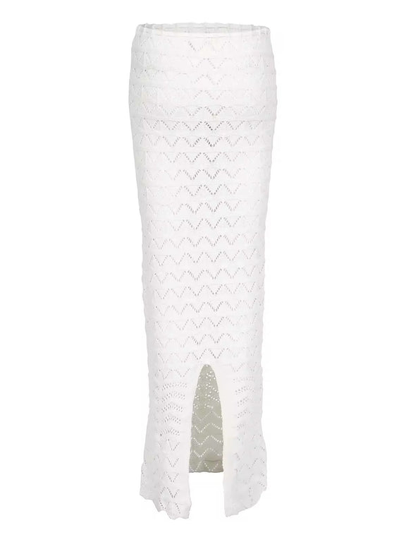 Two-piece Sahara Boho crochet outfit for women in white and brown, featuring an off-shoulder long sleeve crop top and high-waisted maxi skirt with drawstring, perfect for beachwear, festivals, and summer vacations