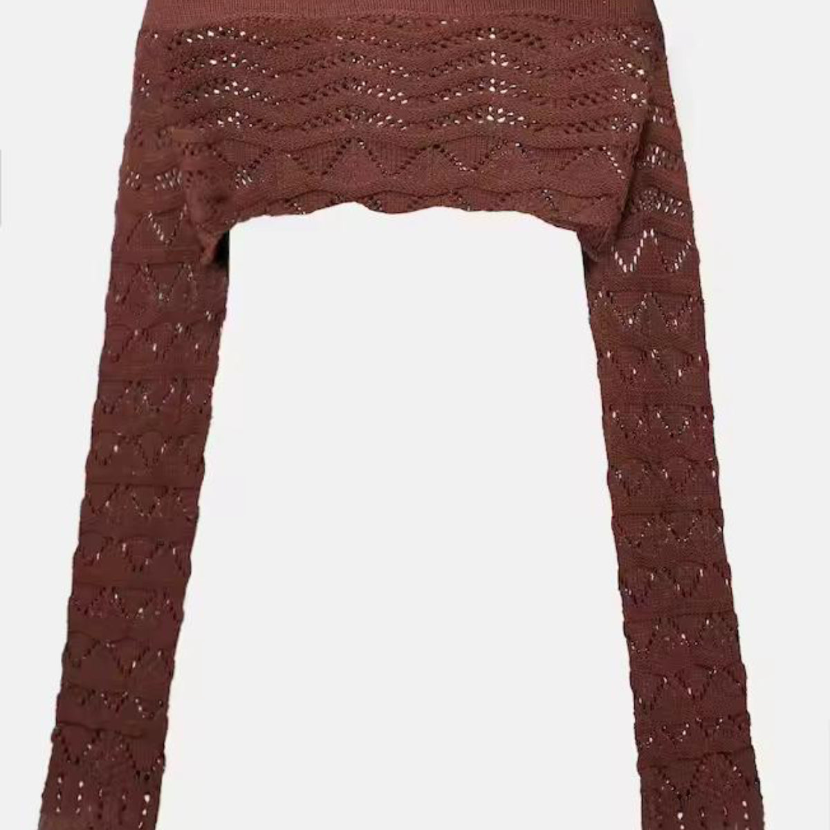 Close-up of crochet off-shoulder long sleeve crop top from Sahara Boho Outfit, featuring detailed knit design and soft, breathable material.