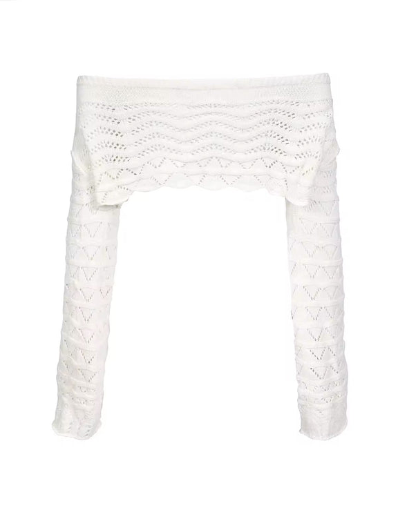 Close-up of crochet off-shoulder long sleeve crop top from Sahara Boho Outfit, featuring detailed knit design and soft, breathable material.