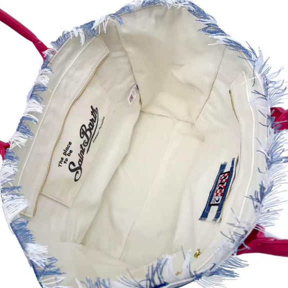 Extra-large Saint Barth canvas beach bag for women with boho fringe and summer script, oversized and handcrafted look.
