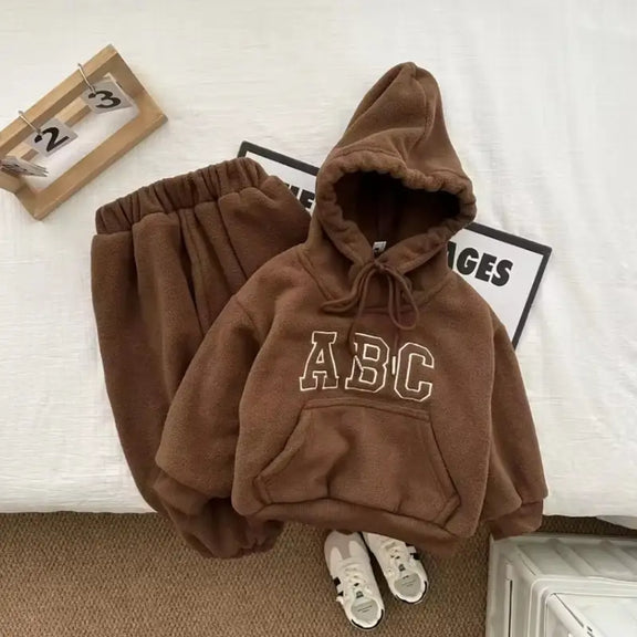 Cozy set of plush hoodie and jogging pants made from 100% polyester, featuring drawstring, kangaroo pocket, and elastic waistband for a comfortable fit, perfect for casual lifestyle or relaxation.