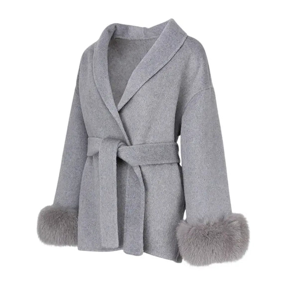 Close-up of removable fur cuffs on Guardian Shearling Jacket, showcasing elegant design and high-quality materials for fashionable outerwear."
