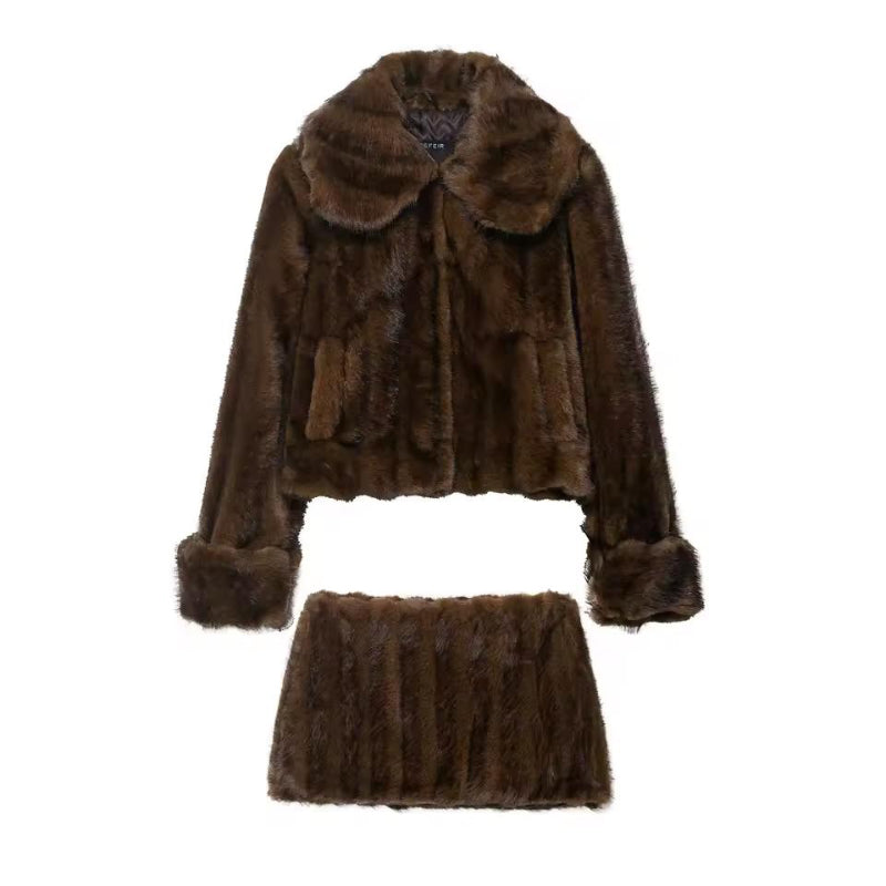 Mira Faux Fur Edition – short brown jacket and mini skirt, soft plush texture, winter outfit for women.

