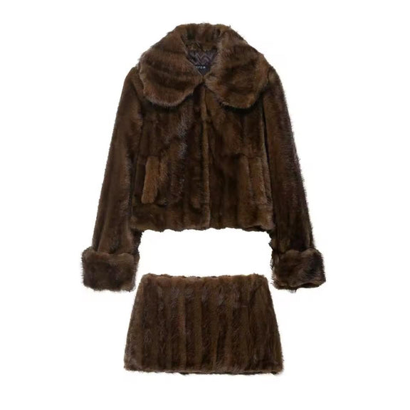 Mira Faux Fur Edition – short brown jacket and mini skirt, soft plush texture, winter outfit for women.
