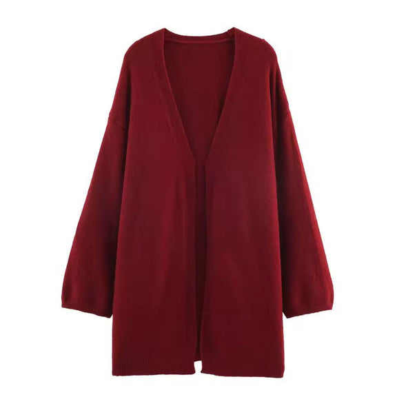 Elegant women’s 3-piece knit set with cardigan, strap top and trumpet skirt in soft fine knit fabric – autumn winter premium knitwear outfit, minimalist style.
