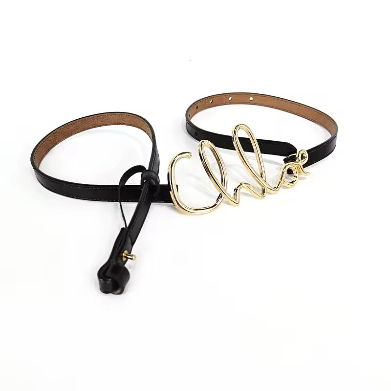 Signature slim leather belt in black genuine leather with gold script buckle – unisex fashion accessory
