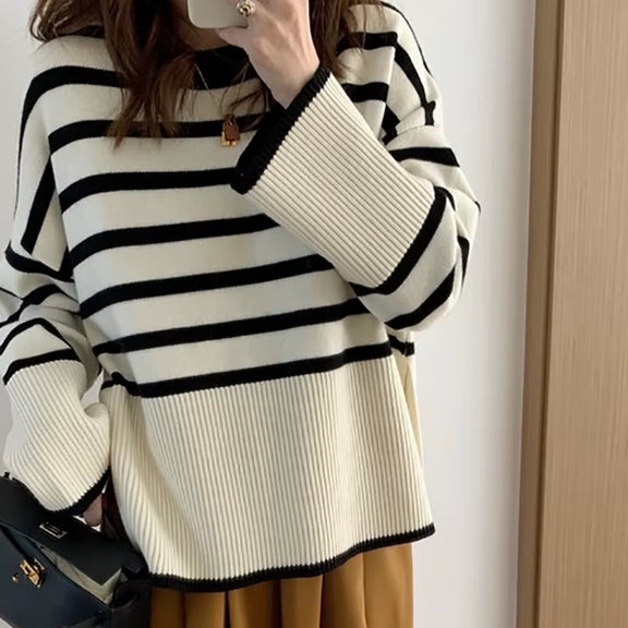 Cozy striped pullover sweater for women – stylish O-neck design in soft fabric for casual wear.