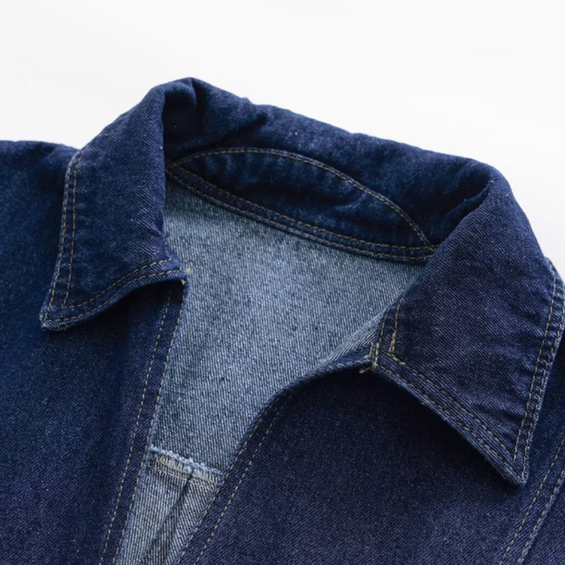 Flat lay of the Soho Denim two-piece outfit – includes cropped V-neck top and wrap denim skirt