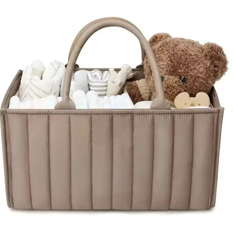 Chic Charm versatile storage bag for baby essentials, made from durable polyester with removable dividers, quilted sides for extra stability, available in various colors and patterns, easy to clean.