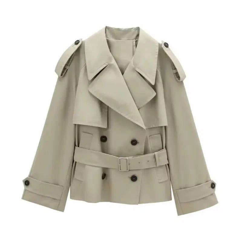 Beige double-breasted coat with black buttons, adjustable belt, and shoulder epaulets, designed for stylish and comfortable wear. Perfect for every occasion, made from high-quality polyester and crafted in Italy.