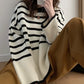 Cozy striped pullover sweater for women – stylish O-neck design in soft fabric for casual wear.