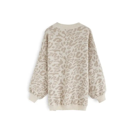 Stylish long sleeve sweater for women in cream with bold leopard print
