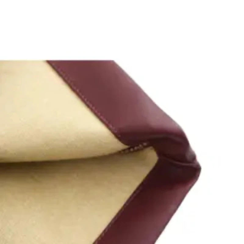 Stylish women's faux leather trousers in a rich burgundy color, versatile for any wardrobe.