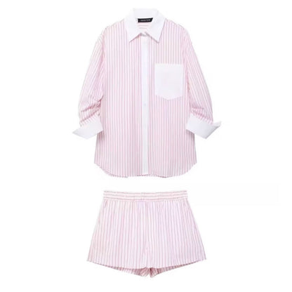 Women’s pink striped lounge set – oversized button‑down shirt with white contrast collar and cuffs, matching elastic‑waist shorts, summer casual two‑piece outfit, poplin cotton blend.
