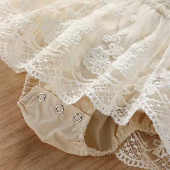 Infant girl photoshoot outfit with floral lace, tulle tutu, sleeveless baby romper boutique style
