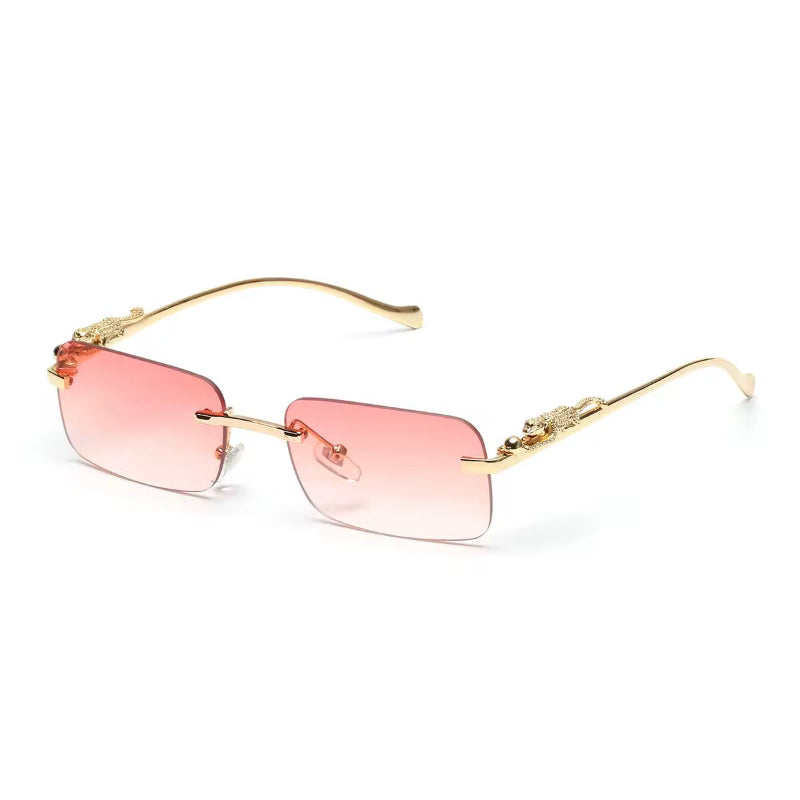 Rose gold rimless sunglasses with gradient lenses and luxury gold panther arms
