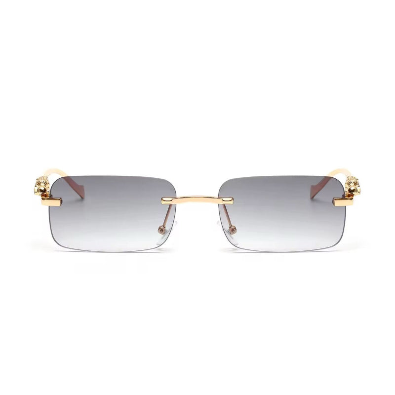 Jet black rectangular rimless sunglasses with UV400 lenses and golden panther arms
