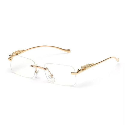 Clear rimless fashion sunglasses with gold metal panther arms and rectangular lenses
