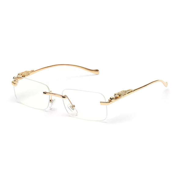 Clear rimless fashion sunglasses with gold metal panther arms and rectangular lenses
