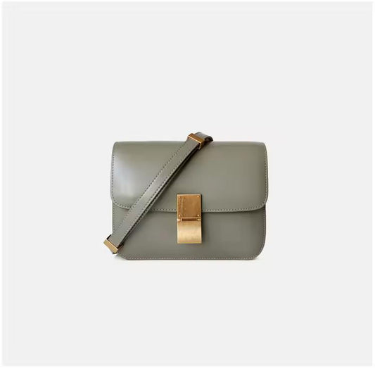 Olive green genuine leather crossbody with gold clasp and modern design — luxury everyday bag for women, versatile and chic.
