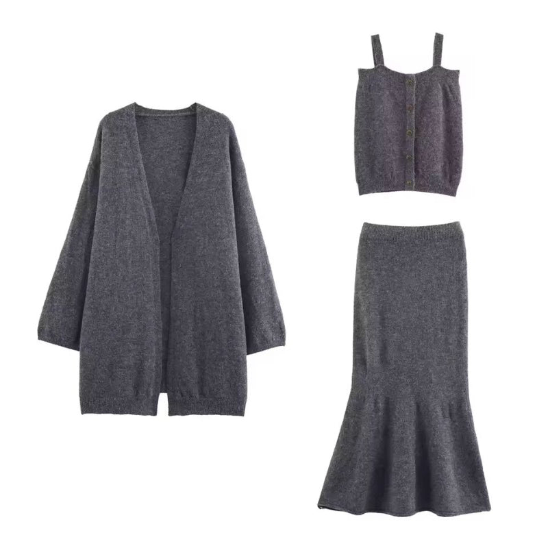 Elegant women’s 3-piece knit set with cardigan, strap top and trumpet skirt in soft fine knit fabric – autumn winter premium knitwear outfit, minimalist style.
