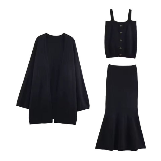 Elegant women’s 3-piece knit set with cardigan, strap top and trumpet skirt in soft fine knit fabric – autumn winter premium knitwear outfit, minimalist style.
