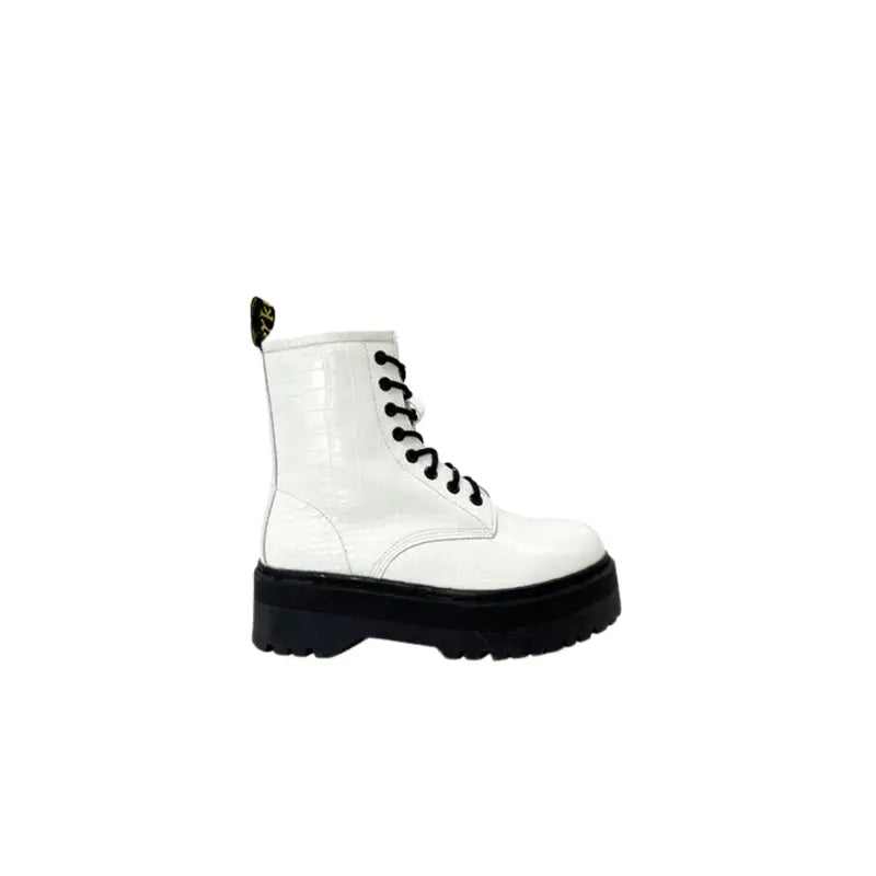 Stylish women’s boots with thick soles and crocodile leather texture in white