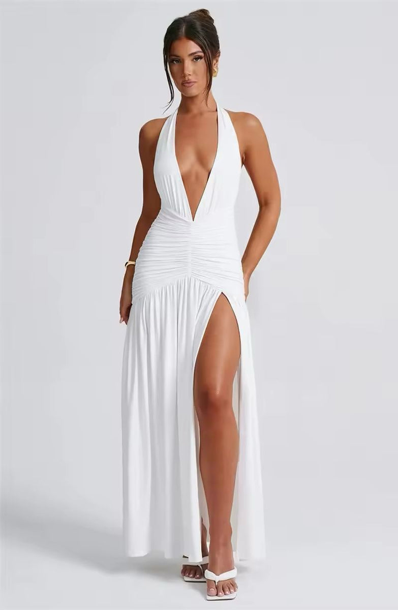 Selena Backless Maxi Dress Weiß – Elegantes rückenfreies Kleid mit tiefem V-Ausschnitt & figurbetonter Passform. Perfekt als Sommerkleid, Hochzeitsgast-Kleid oder Abendmode.  White backless maxi dress, deep V-neck, figure-hugging fit, perfect for weddings & summer events.