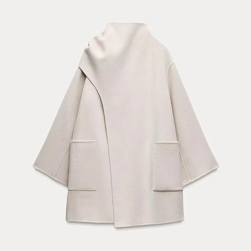 White Elegant loose fit women's overcoat in extra long style, perfect for cold weather