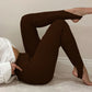 Stylish ribbed knit leggings with stirrup design for women.