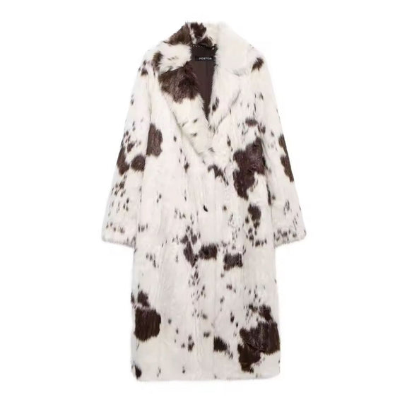 Women’s faux fur coat with brown and white animal print pattern.