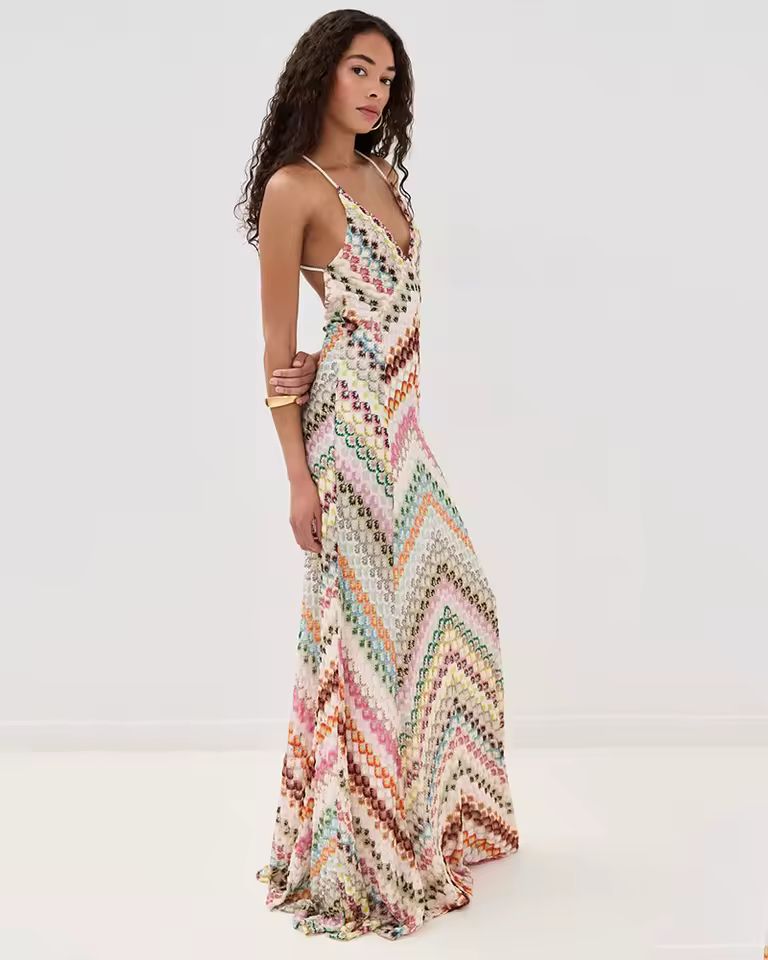 Wild Orchid Dress close-up front with asymmetrical floral pattern, V-neckline and fabric detail