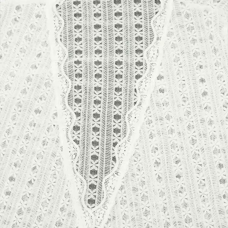 Women’s white lace blouse with wrap tie and slim fit design
