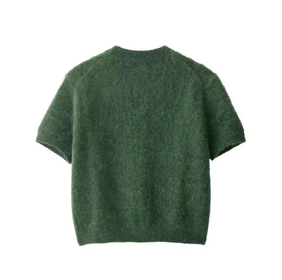 Close-up of soft green knit texture – Chic and Charm Green Whisper women’s cardigan polyester blend