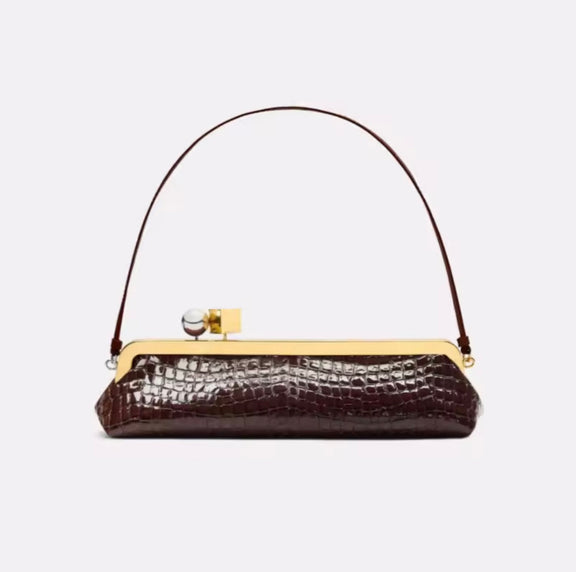 Interior of Chic and Charm Golden Clip Baguette Bag – PU leather clutch with polyester lining