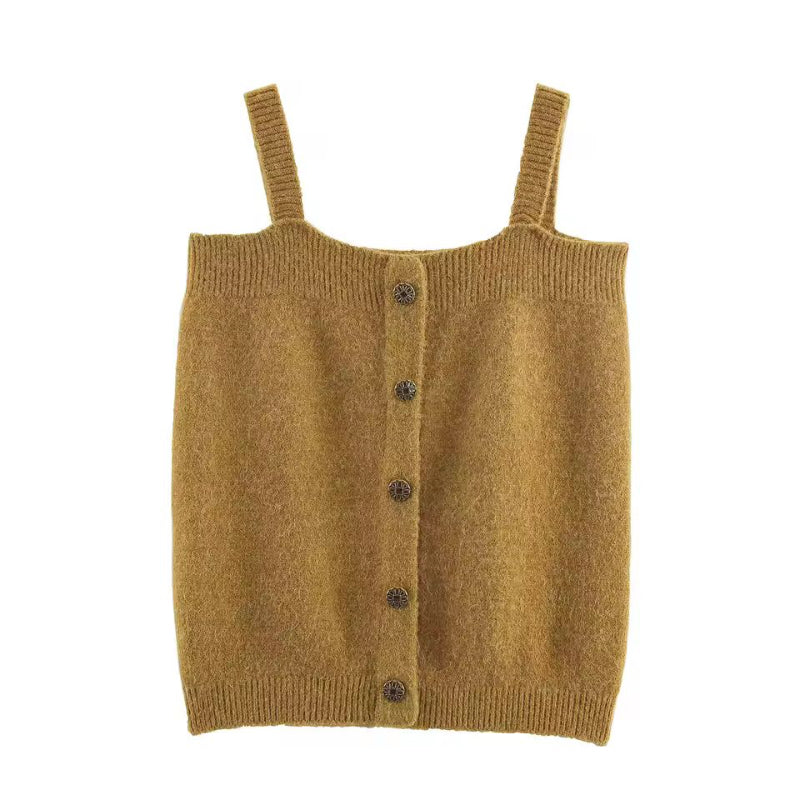 Flat lay of elegant 3-piece knitwear set for women – minimalist cardigan, knit top and trumpet skirt in taupe color, cozy chic style.
