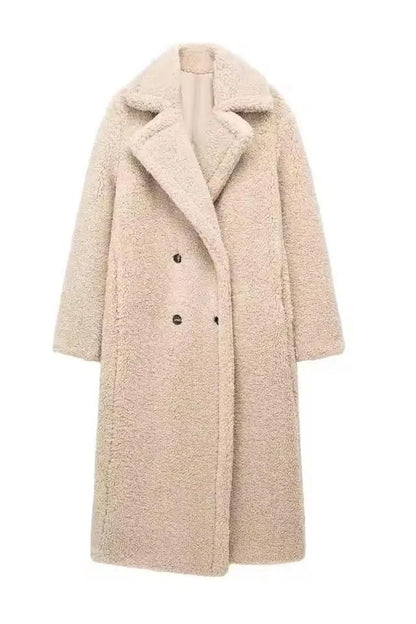 Women's long beige teddy coat – double-breasted faux shearling winter coat with lapel collar and soft lamb fleece texture.
